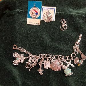 Vintage Silver Charm Bracelet. Extra charms are sterling silver, per packaging.